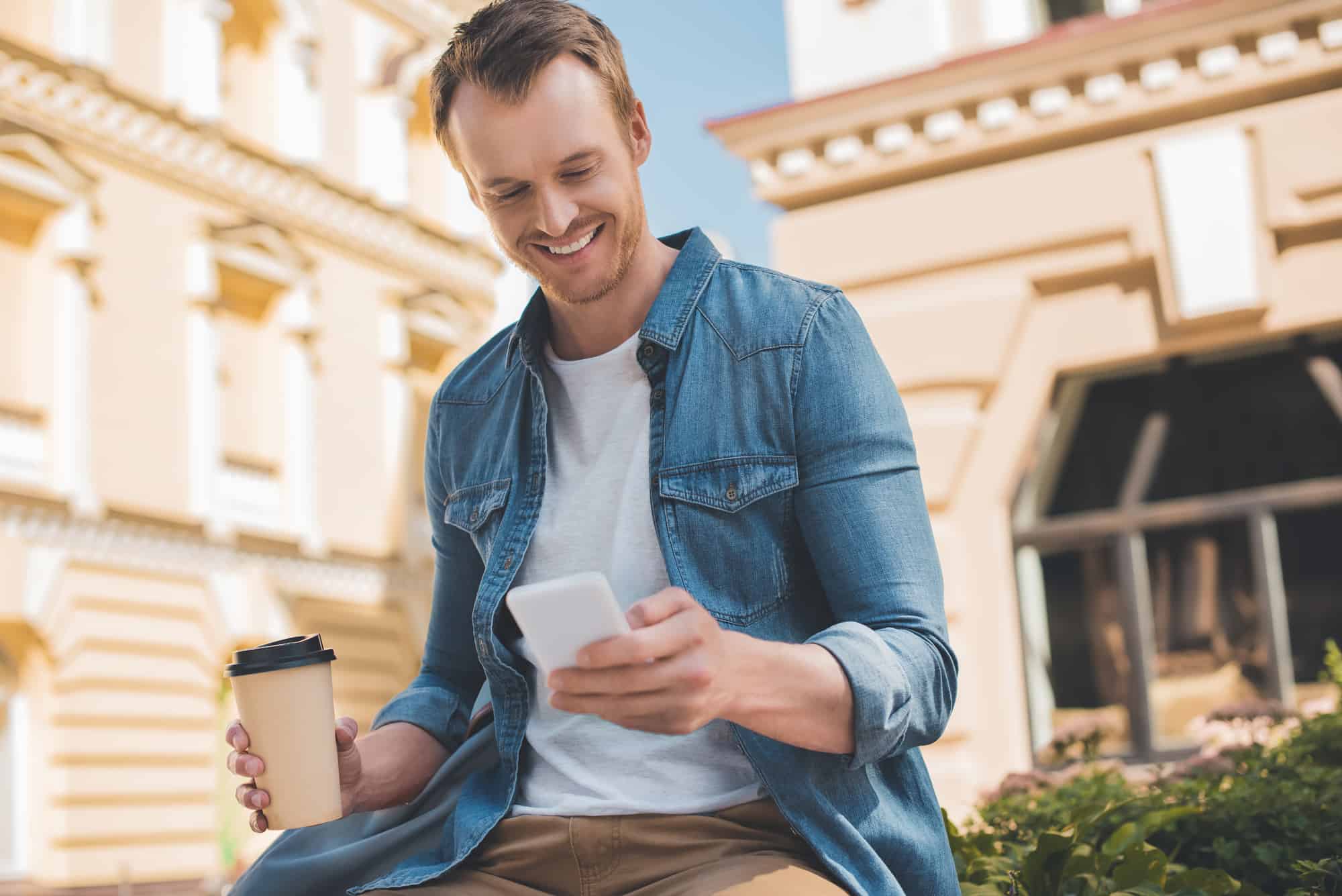 depositphotos_217655648-stock-photo-happy-young-man-coffee-using depositphotos_217655648-stock-photo-happy-young-man-coffee-using